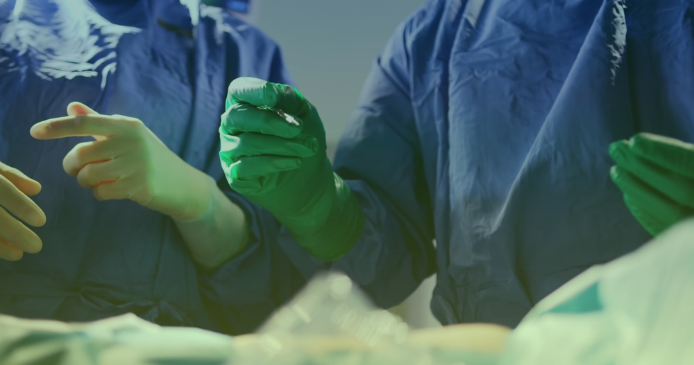 Image,Of,Two,Caucasian,Male,Doctors,During,Surgery.,Work,And