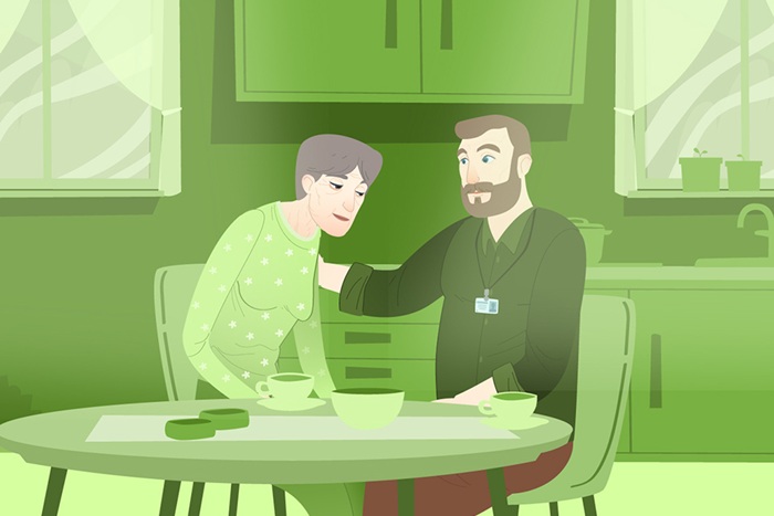 Illustrasjon av to mennesker som snakker sammen ved et bord