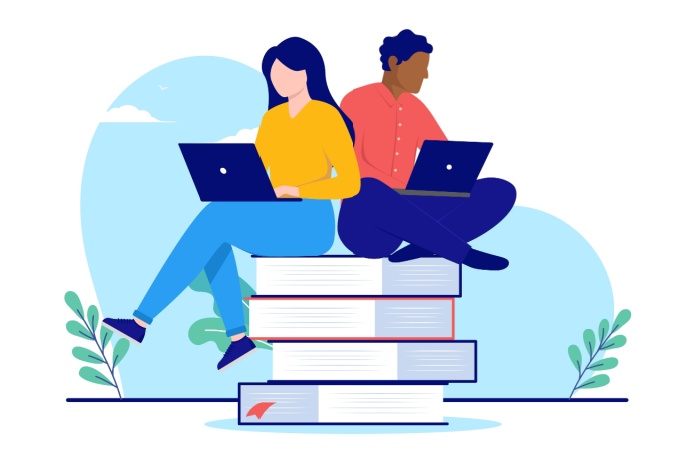 Mann og kvinne sitter oppå en stabel med bøker med hver sin pc.